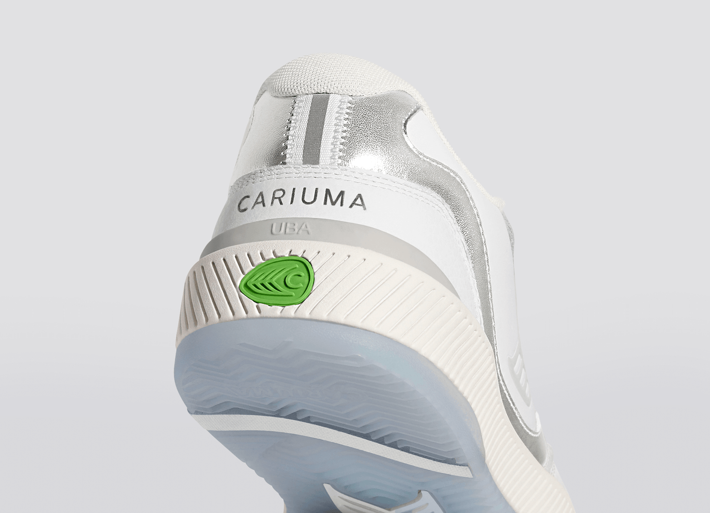 UBA White Leather Metallic Accents Ice Logo Sneaker